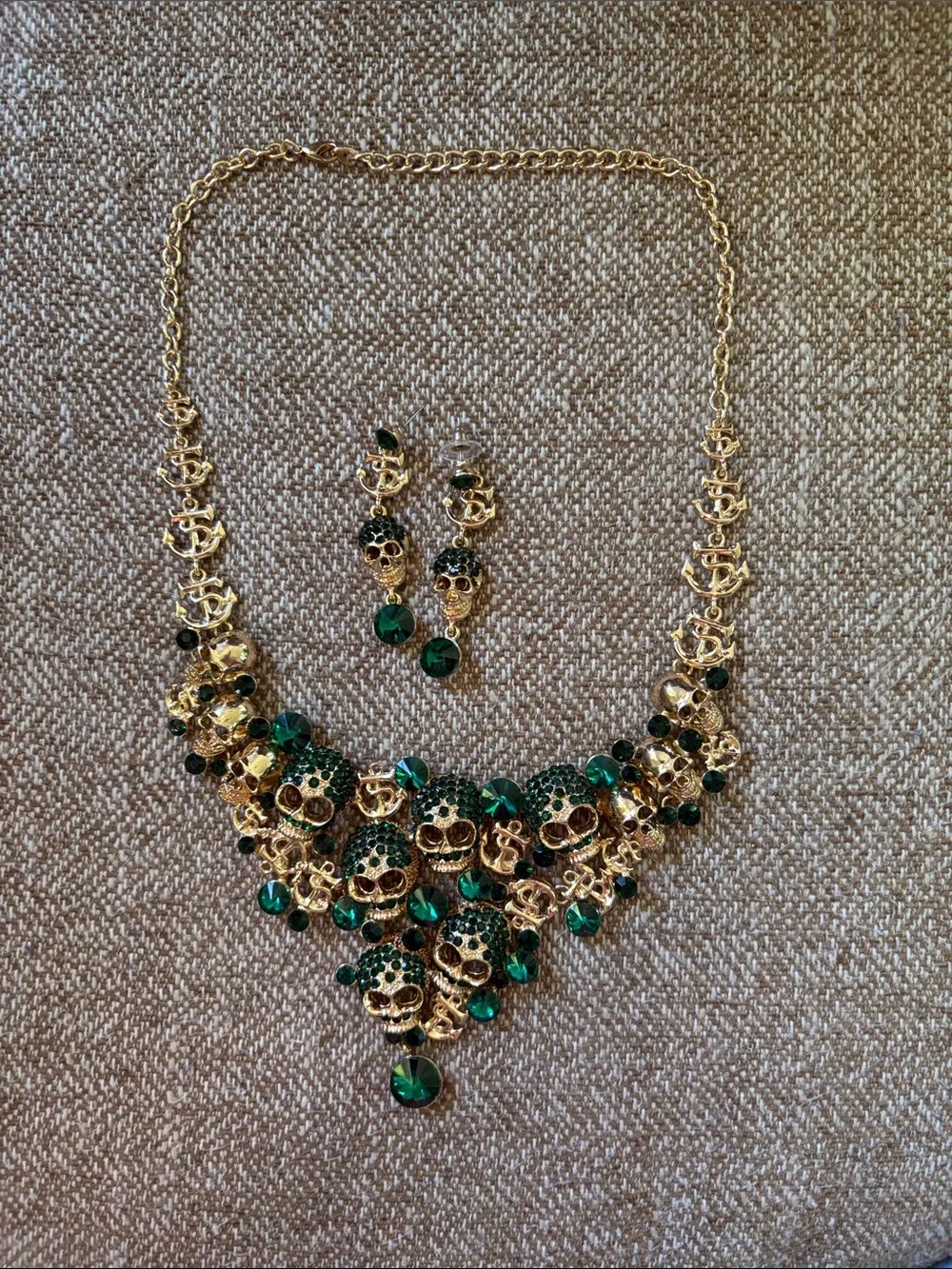 Gold-Tone Skull Necklace & Earring Set with Emerald Green Crystals
